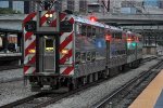 Outbound commuter approaches the station to makes its stop